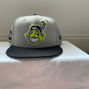 Cleveland Indians New Era snap back hat. Grey with black bill.